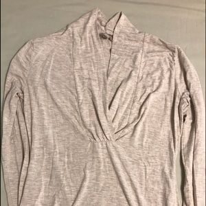 Jersey blouse v-neck. Very flattering on.